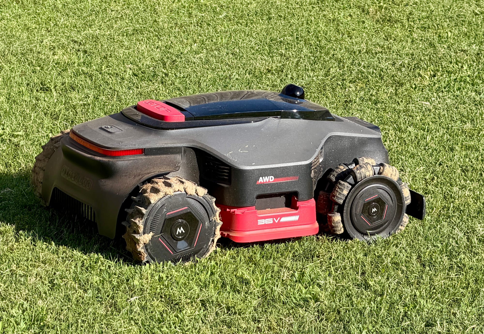 MOVA LiDAX Ultra 3000 AWD wheels packed with mud after getting stuck in soft clay soil