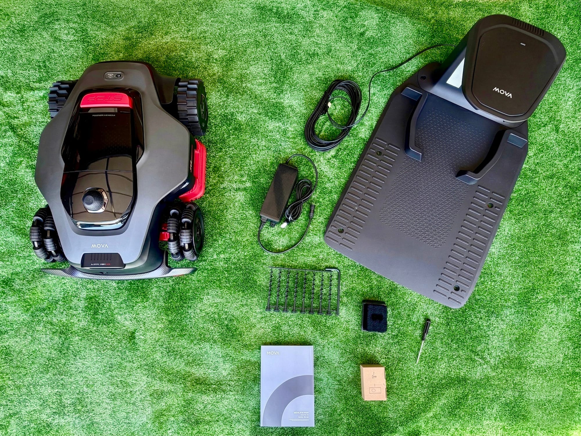 MOVA LiDAX Ultra 3000 AWD box contents including charging station, blades, and accessories