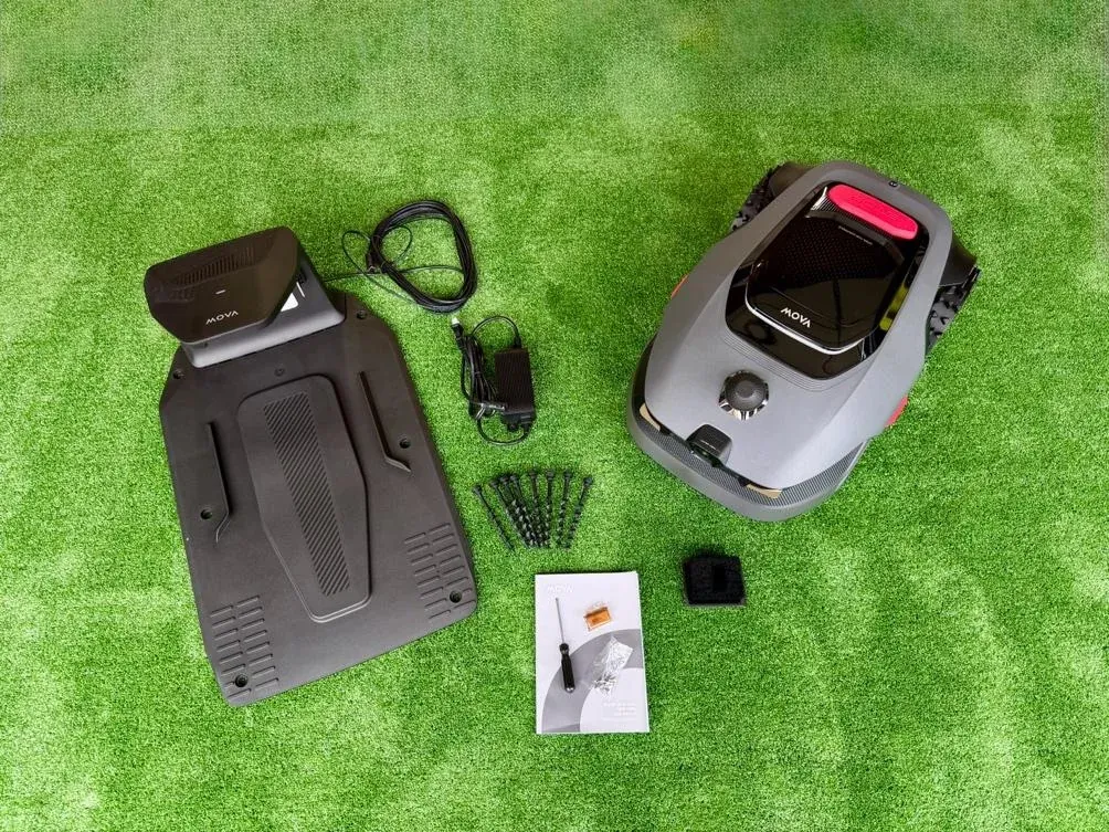 MOVA LiDAX Ultra 2000 unboxed accessories including charging tower, blades and manual