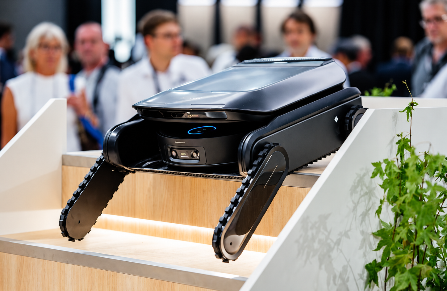 Dreame Cyber X stair-climbing robot carrier demonstrated on a staircase at IFA 2026.