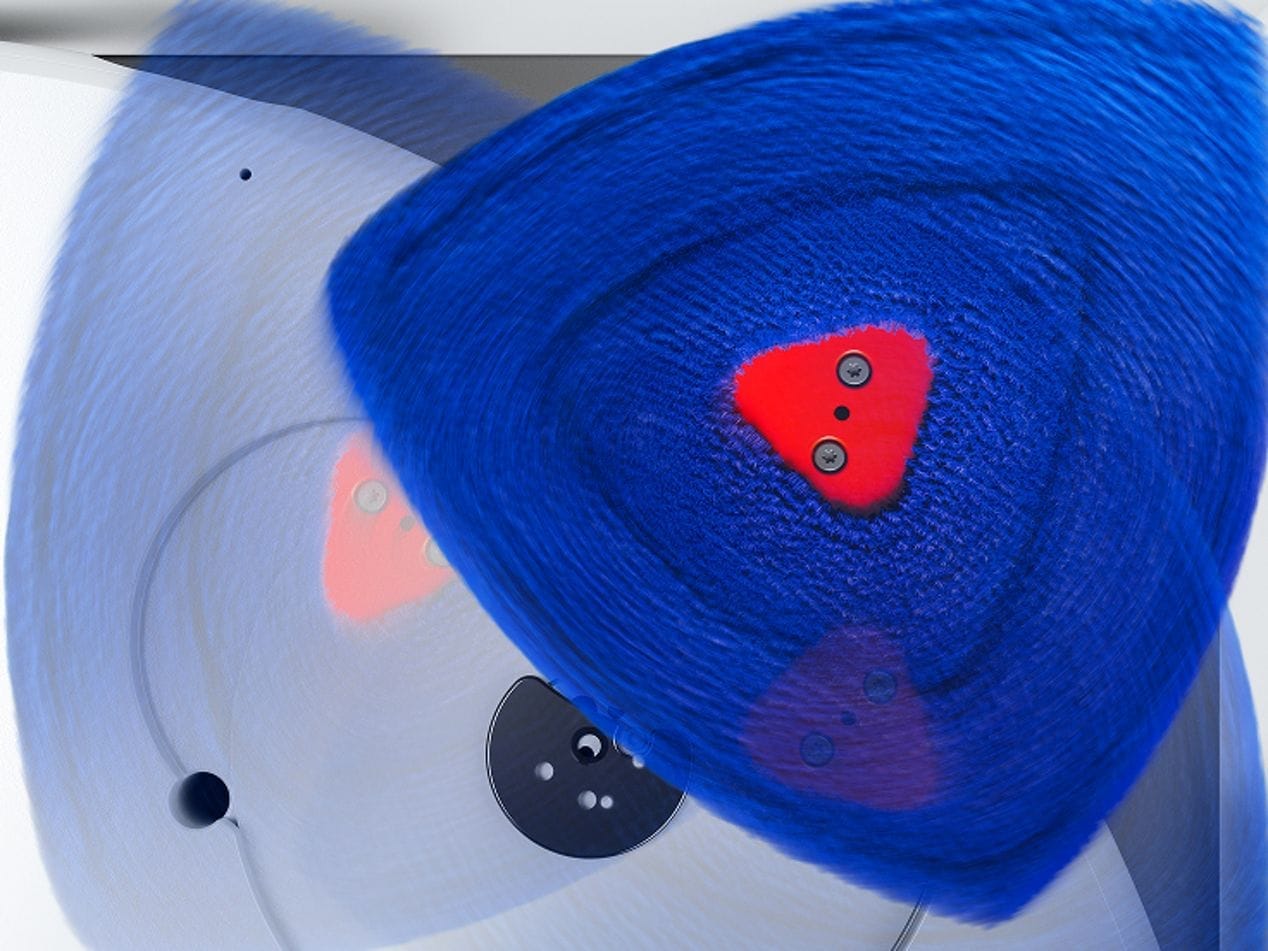 Close-up of the Dyson R2 Nurovi Wash+Dry triangular blue mop pads rotating beneath the robot.