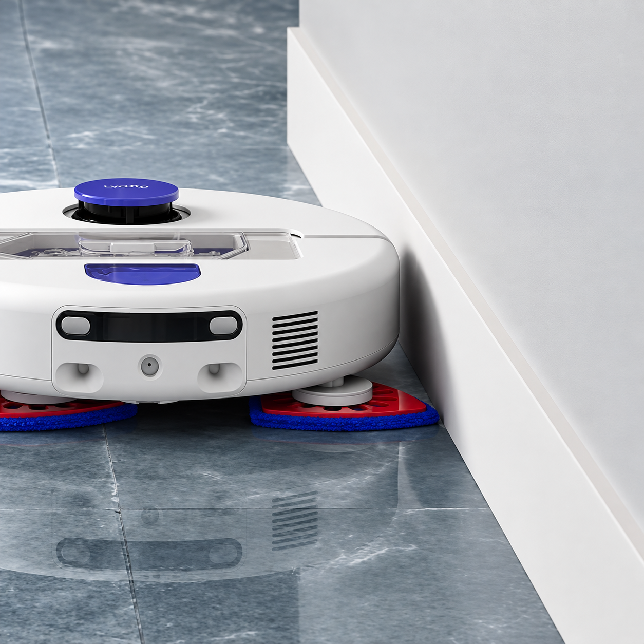 Dyson R2 Nurovi Wash+Dry robot vacuum cleaning along a wall with its triangular mop pads extended to the edge.
