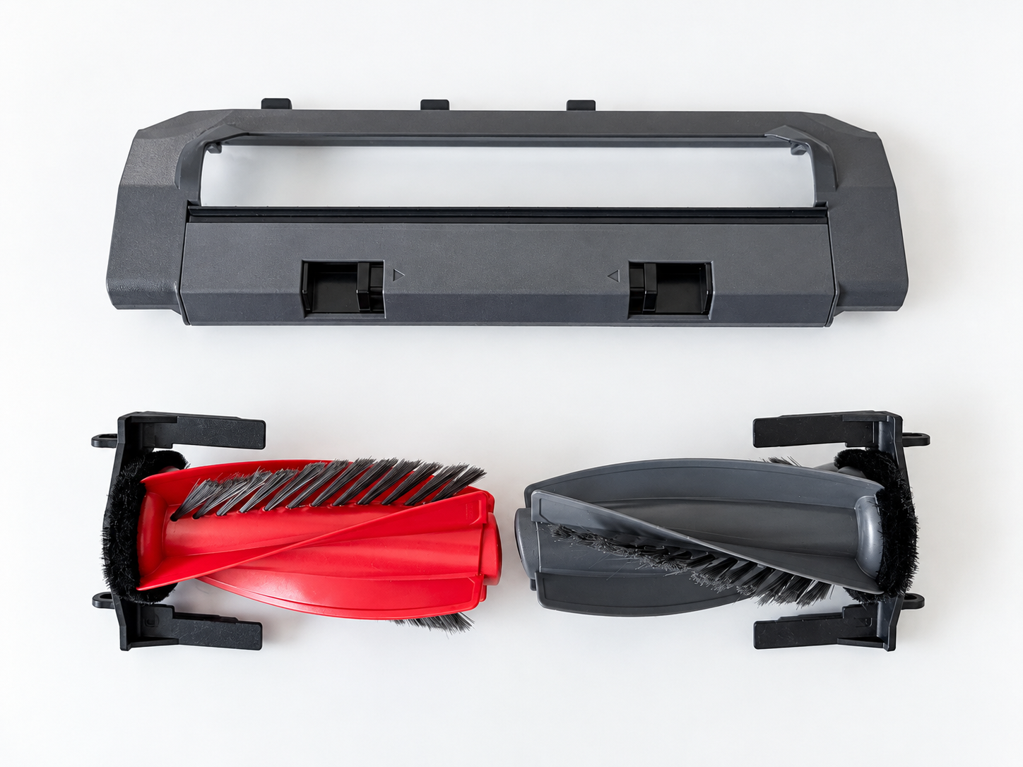 Roborock Saros 20 Flow's removable DuoDivide main brush, showing its separate red and black spiral rollers and brush housing.