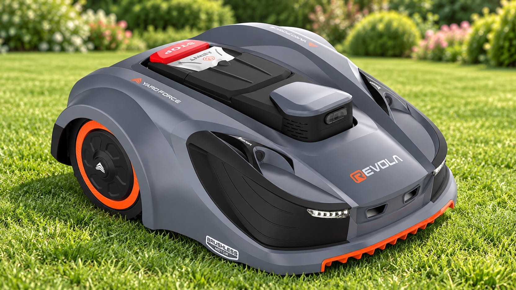 Gray Yard Force Revola robotic mower with orange trim on a green lawn.