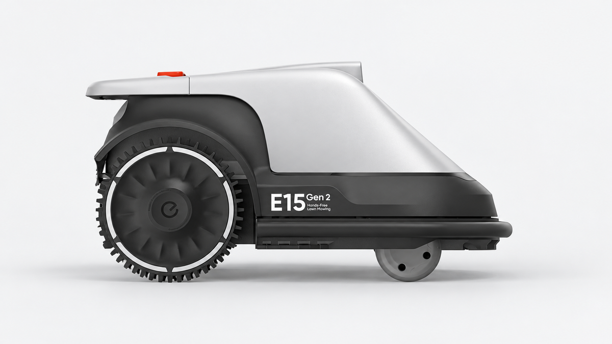 Side view of the silver and black Eufy E15 Gen 2 robotic lawn mower against a light gray background.