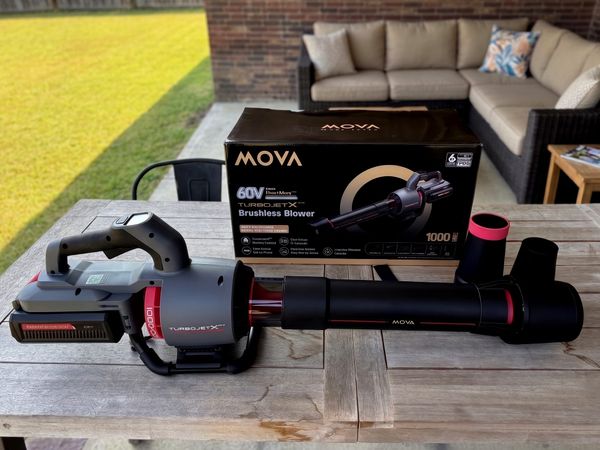 MOVA 60V TurboJetX GB628 leaf blower unboxed with battery, charger, and nozzle attachments