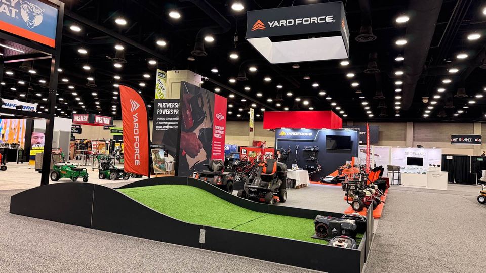 Yard Force booth at Equip Exposition, featuring lawn care equipment and product displays.