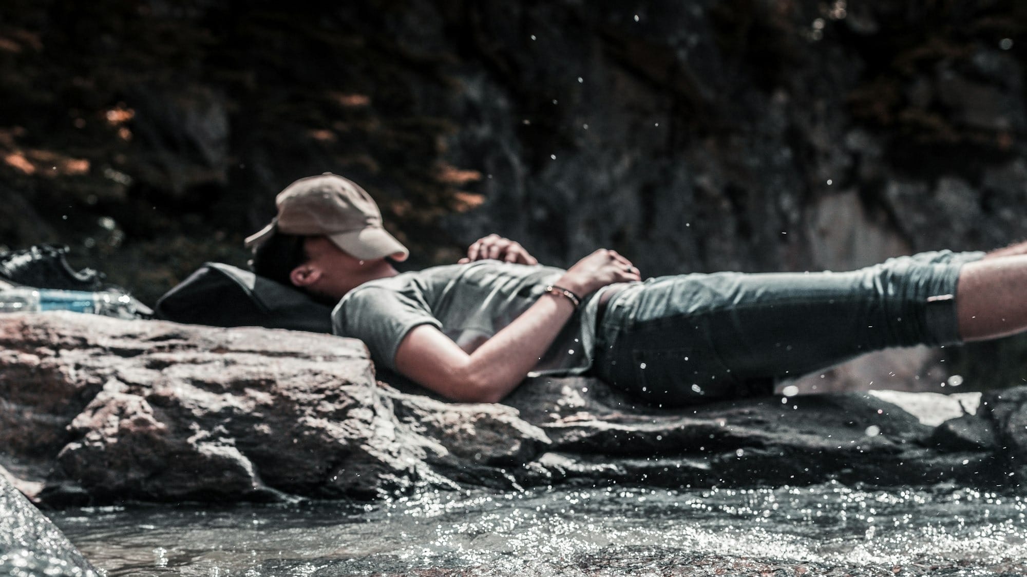 A person sleeping on river.