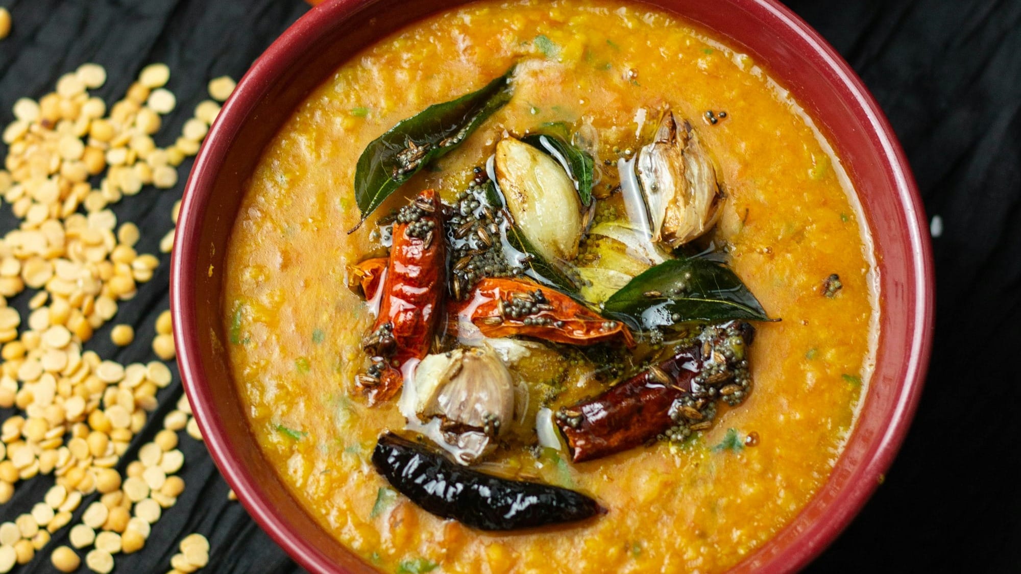 orange round bowl with rice and vegetables