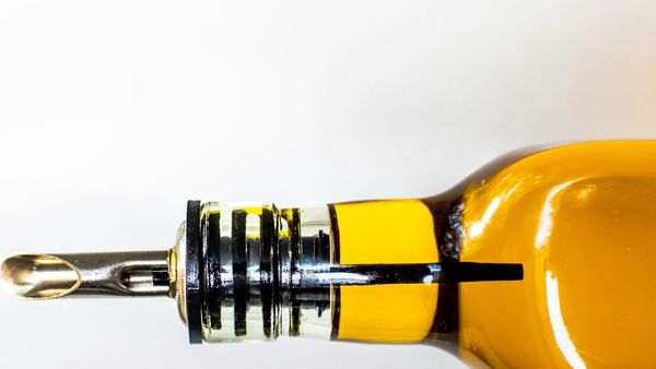Bottle of oil with a drizzle top.