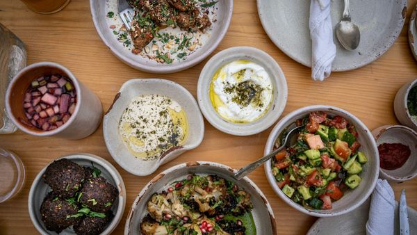 Table full of Mediterranean dishes.
