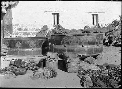 huge cauldrons in which tea is boiled for the monks in Lhasa