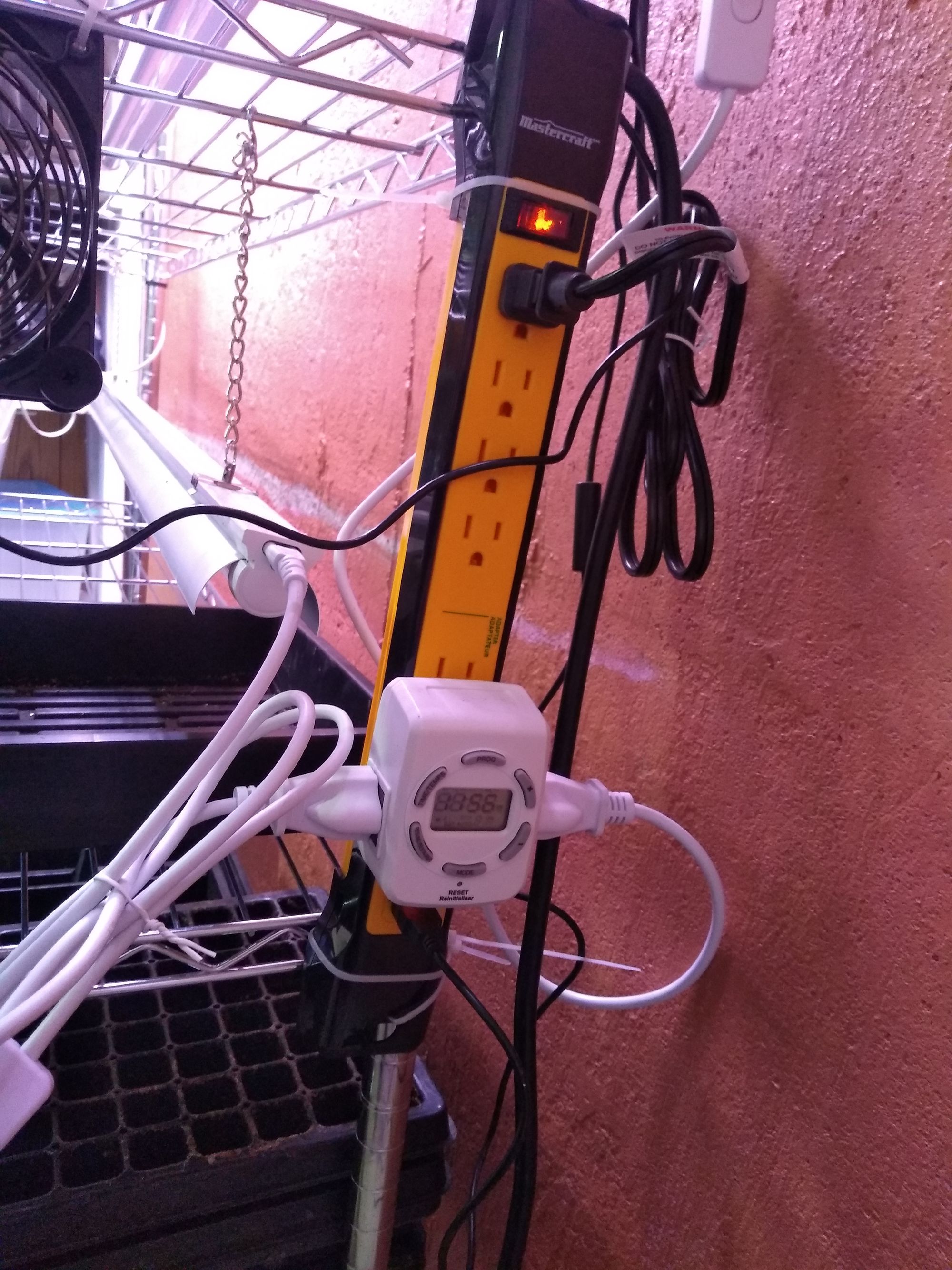Growing shelf power bar zip-tied to shelf frame.