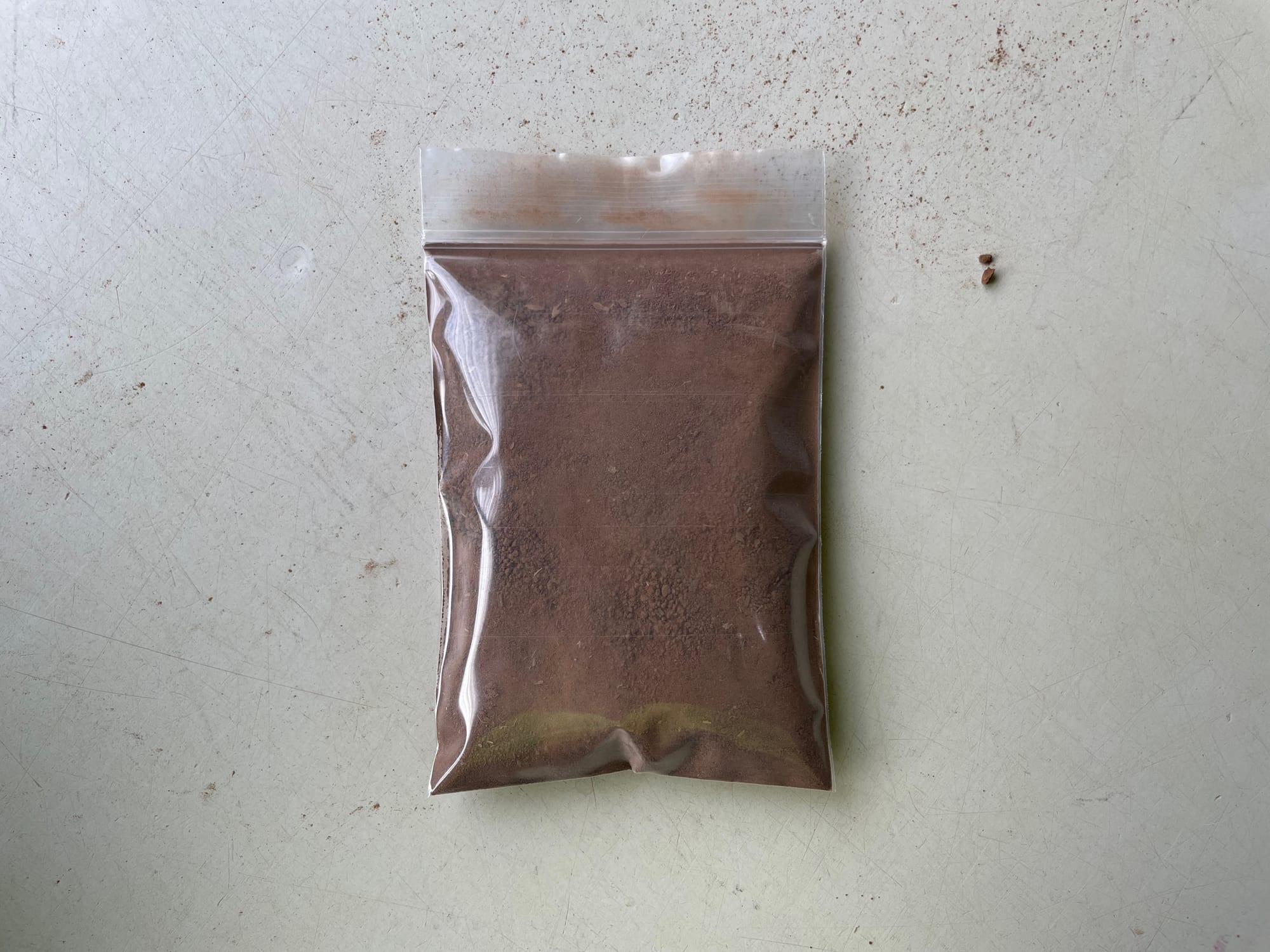 Prepared soil in small plastic ziplock bag ready for labelling and shipping.