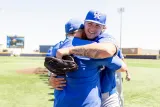 Left-handed pitcher Jackson Soucie gives a hug following a 6-5 win in an NCAA Tournament game.