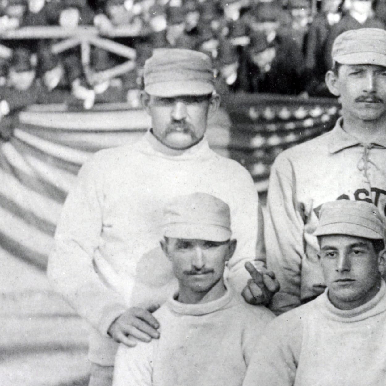Bonus history: in this 1886 team photo, Radbourn (top left) delivers the first known photographed middle finger. Public domain.