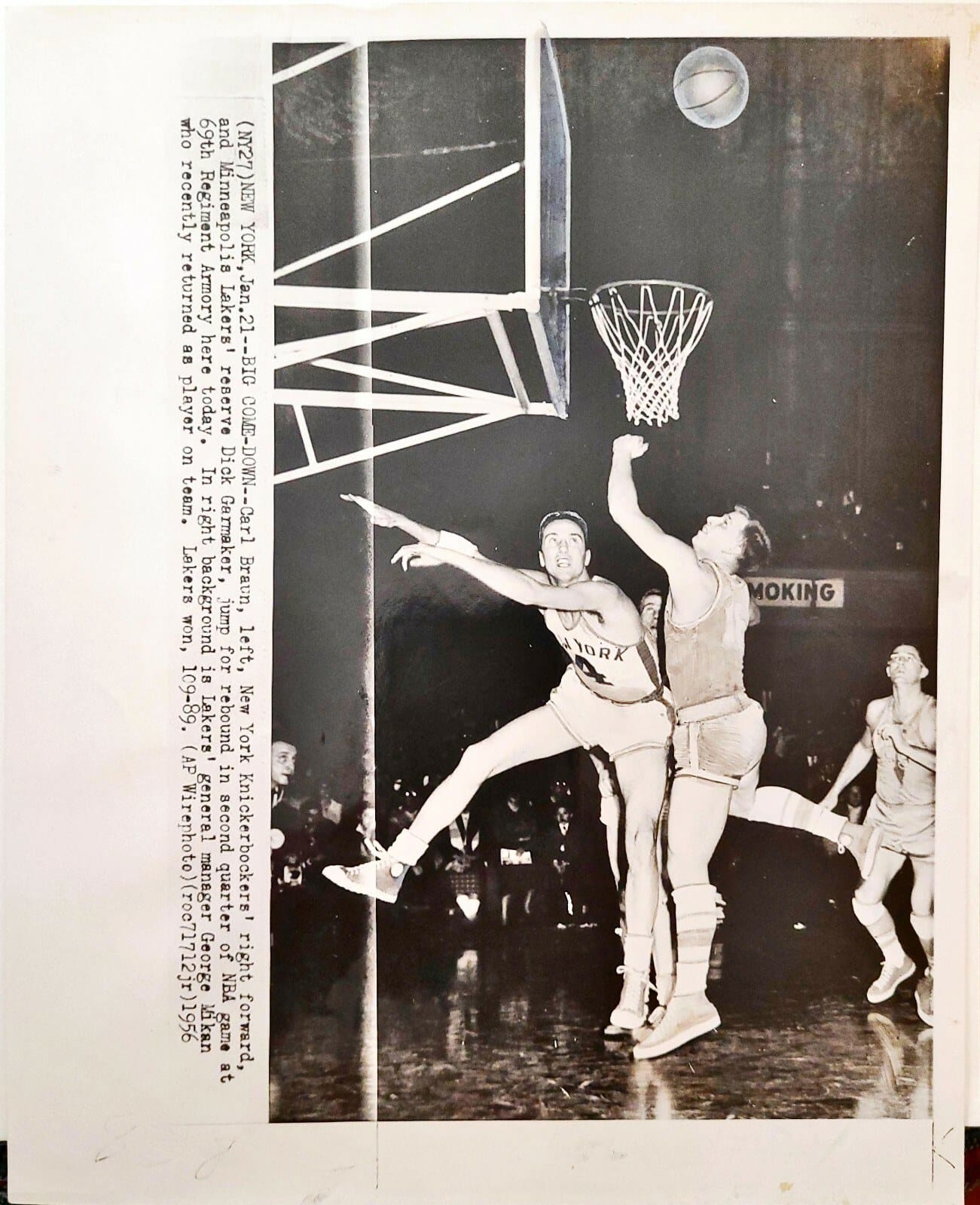 NBA basketball under the armory rafters — Knicks vs. Lakers on the drill floor