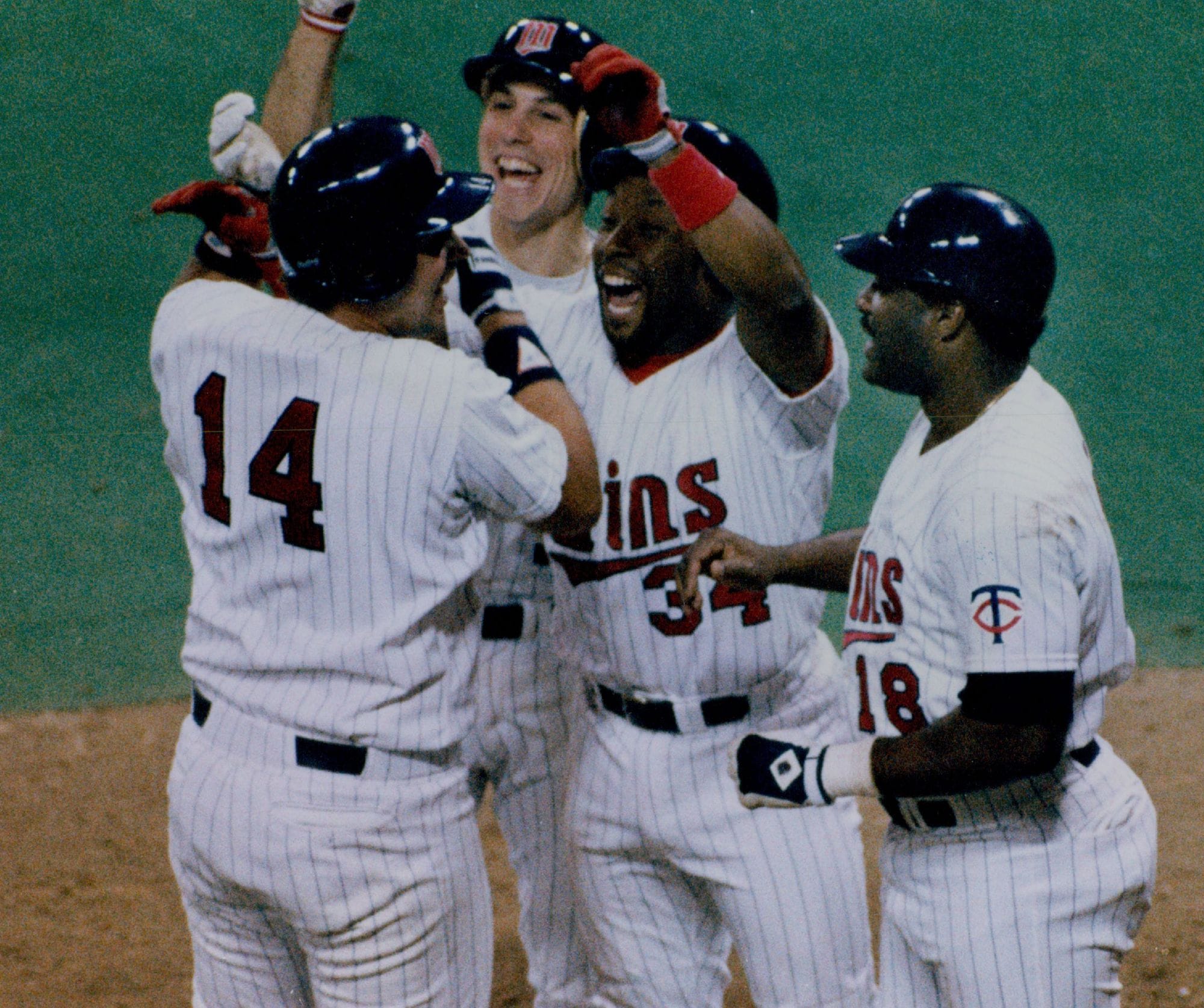 Kent Hrbek (14) and Kirby Puckett (34) celebrate at the Metrodome, 1987.