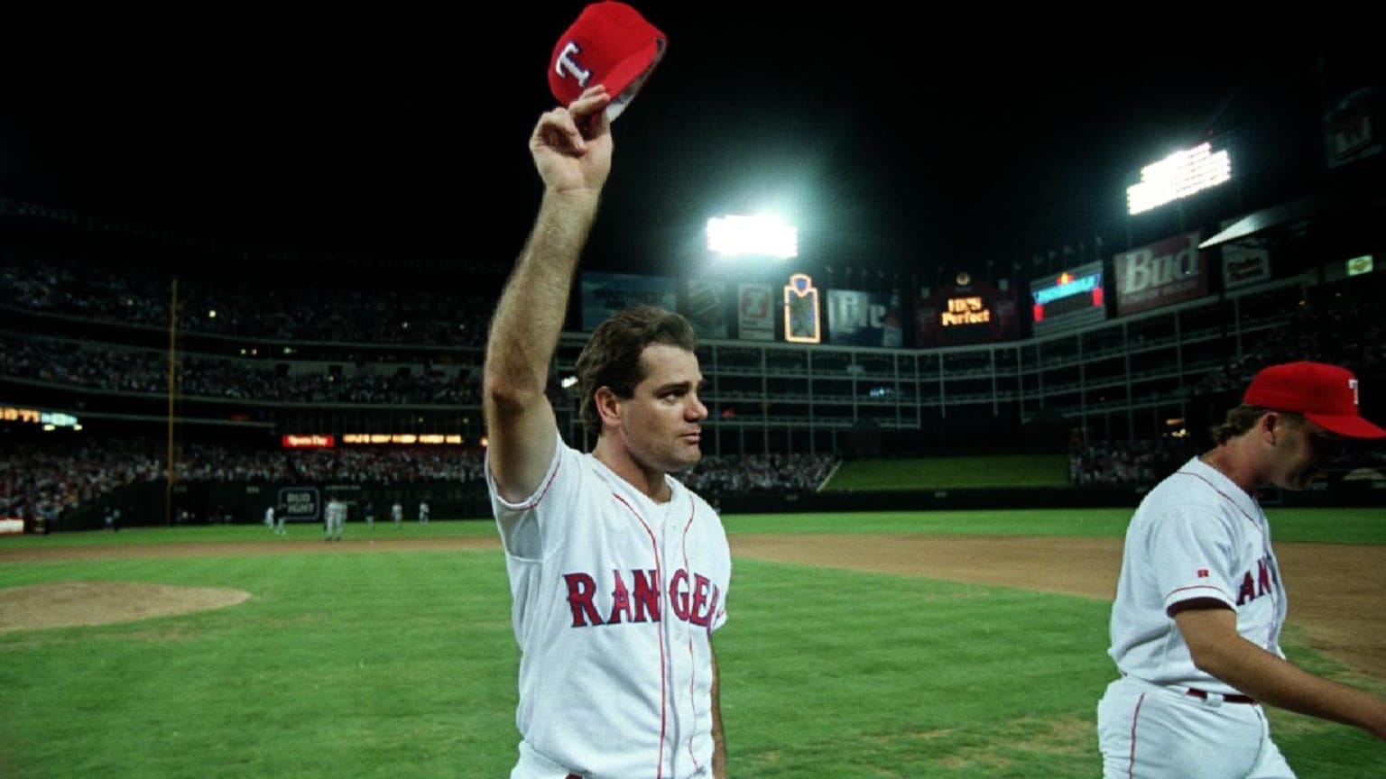 Kenny Rogers tips his cap after his perfect game at The Ballpark in Arlington, July 28, 1994.