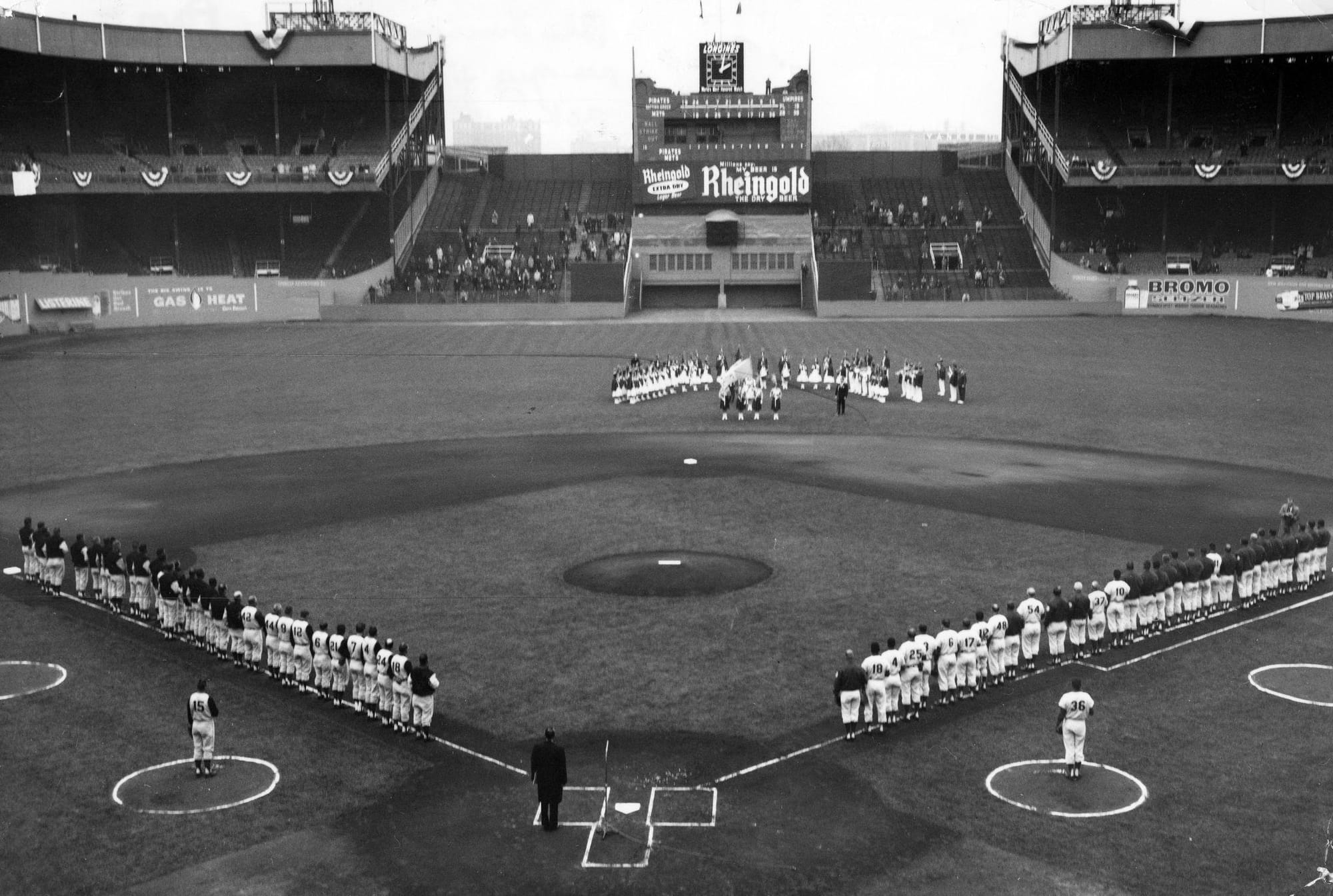 Opening Day at the Polo Grounds, Mets and Pirates on the baselines. The clubhouse sat in dead center field, 483 feet away.
