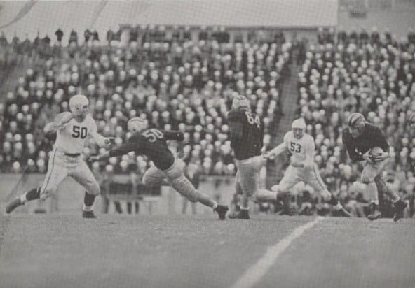 Tony Butkovich carries the ball for Purdue around 1943.