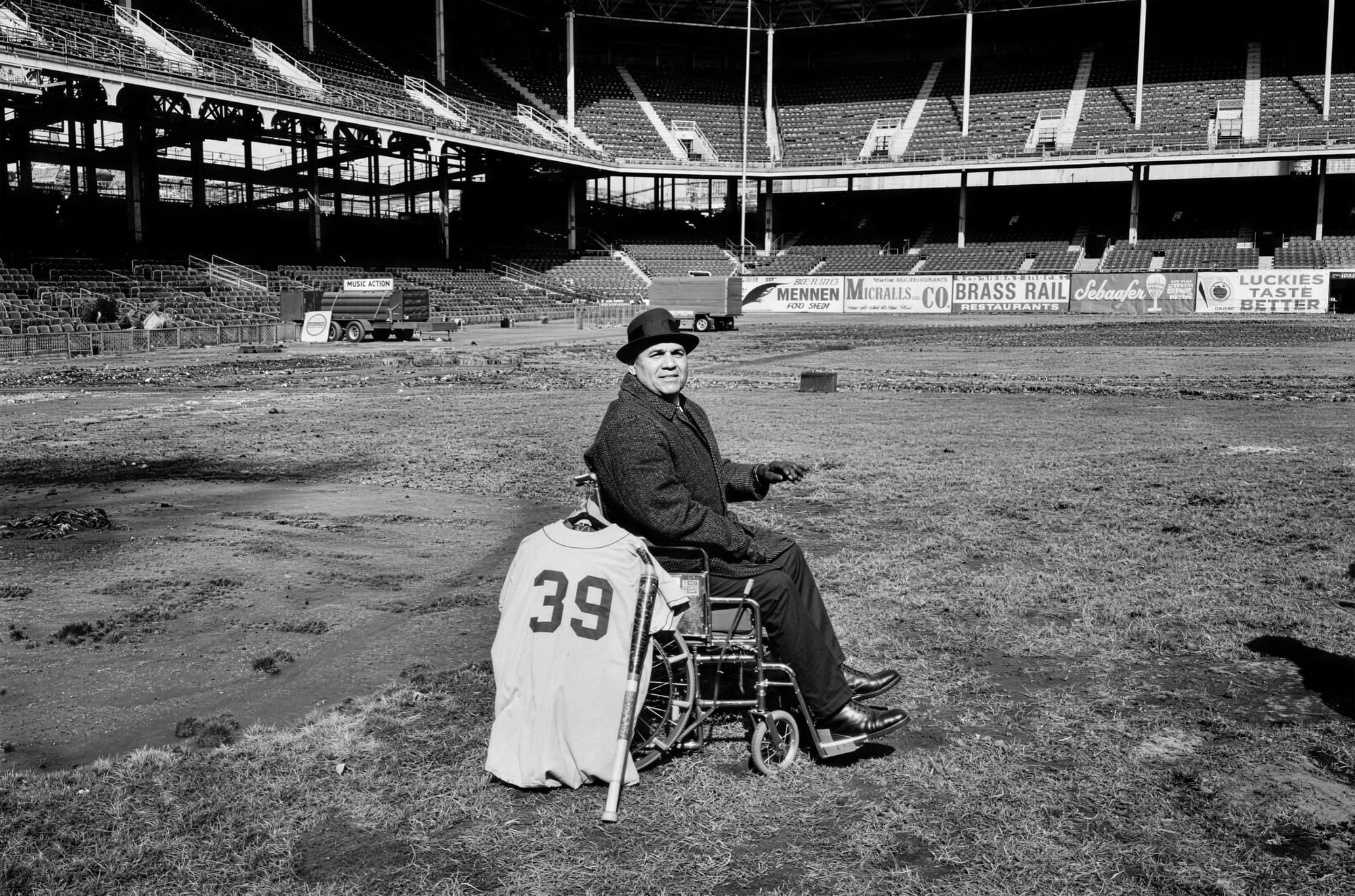 Roy Campanella on the field at Ebbets Field, February 23, 1960. His number 39 jersey hangs on the wheelchair.