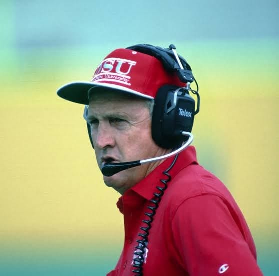 John Cooper in scarlet — 2-10-1 against the only team that mattered.