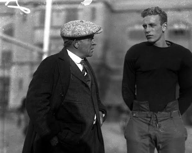 Stagg at Chicago with one of his players — he coached there for 41 years.