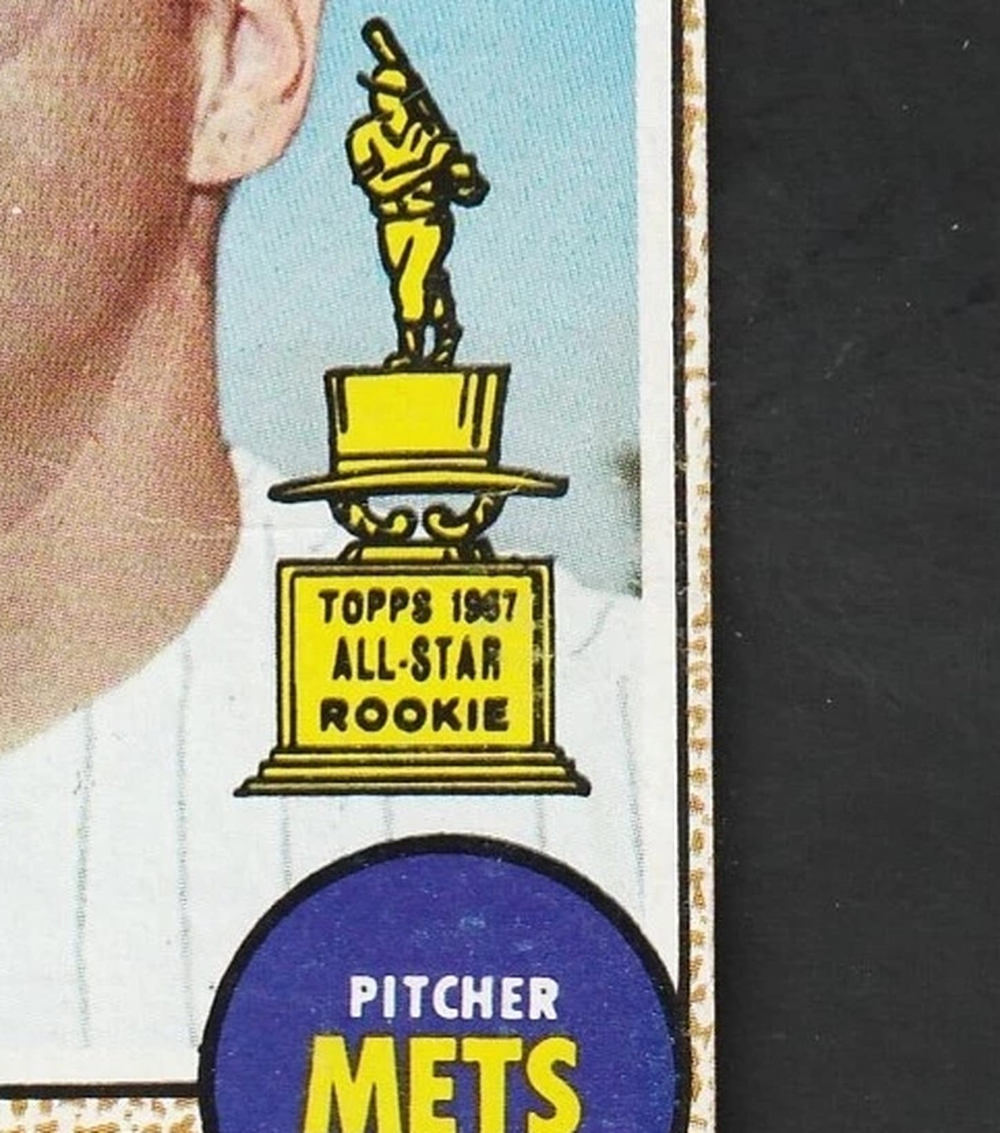 The award as it looked in 1968: a gold batter standing on a top hat, on Tom Seaver's card.