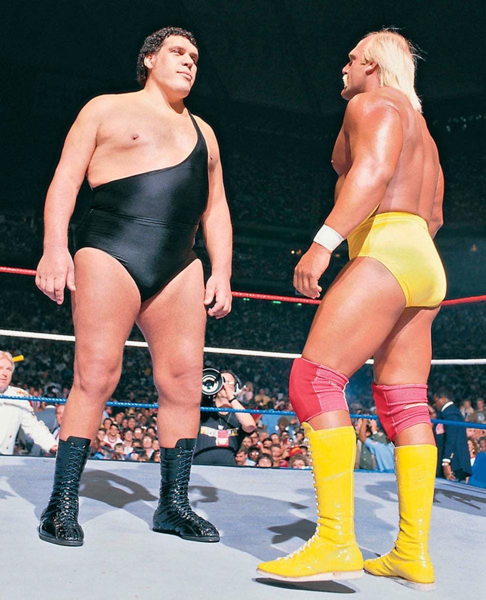 Hogan and Andre the Giant face off. Their WrestleMania III match drew a reported 93,000.
