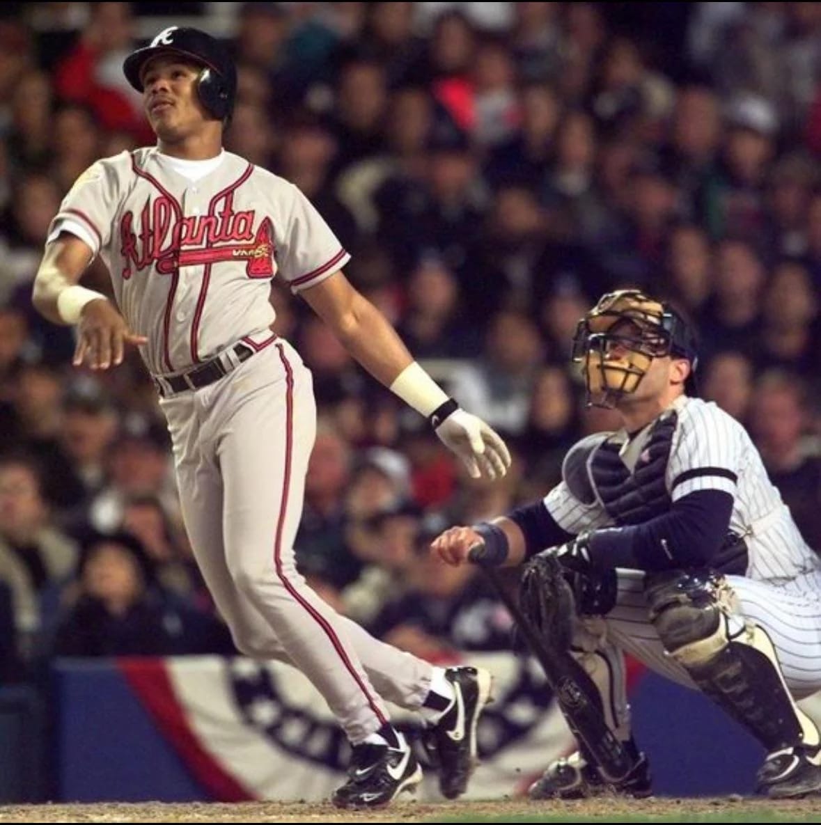 Andruw Jones at Yankee Stadium, World Series bunting on the rail, October 1996.