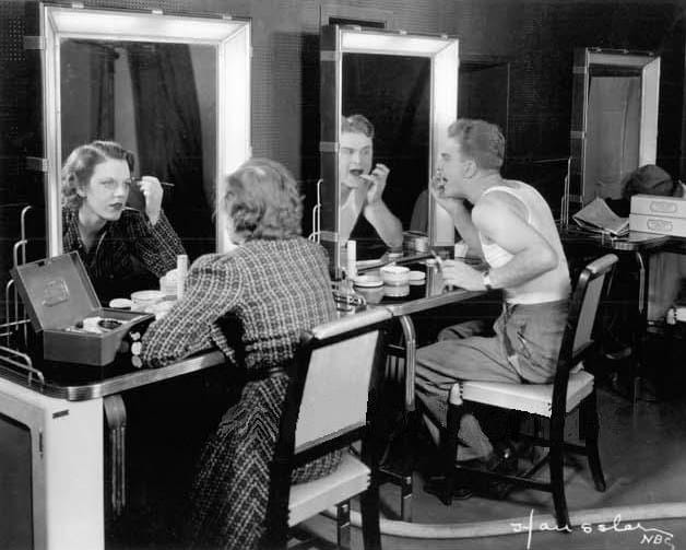 Inside NBC's early TV operation: Eddie Albert and Grace Brandt put on makeup for the first TV play, in 1936. (NBC)