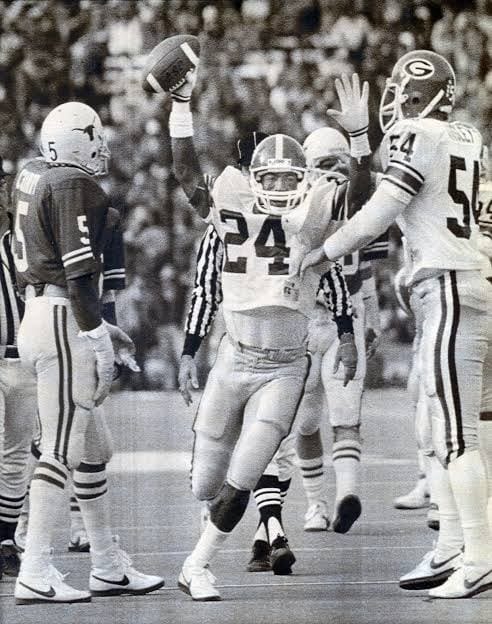Georgia celebrates the muffed punt that undid 11-0 Texas — Cotton Bowl, Jan. 2, 1984.