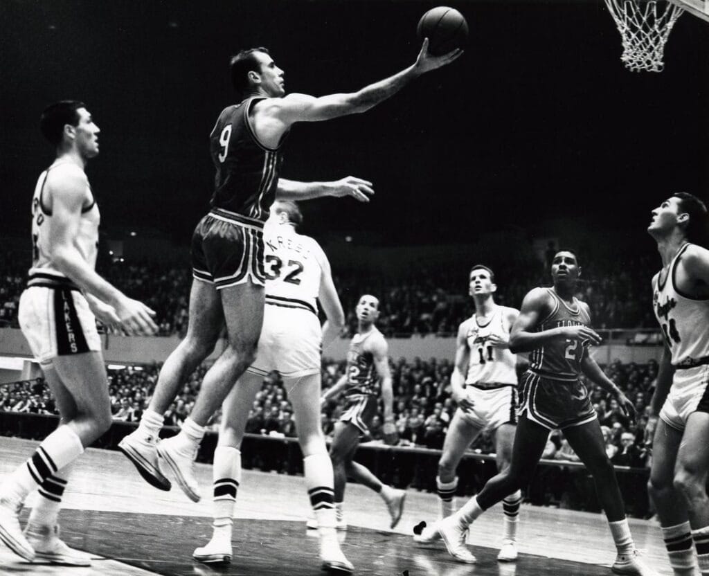 Pettit (9) goes up for a layup.