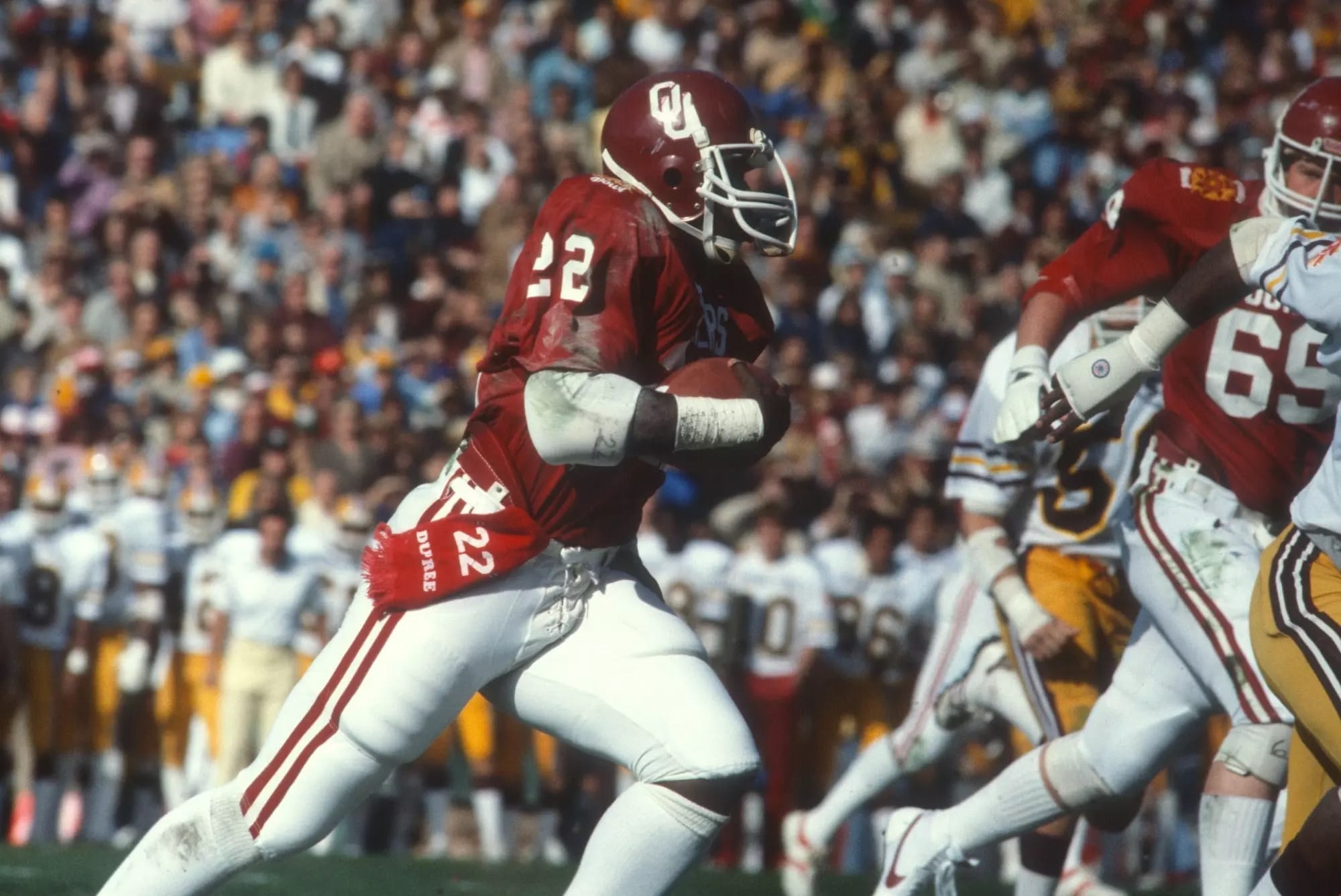 Marcus Dupree in Oklahoma crimson. This is the part everyone agrees on: for about a year and a half, he was the best running back anybody had ever seen.