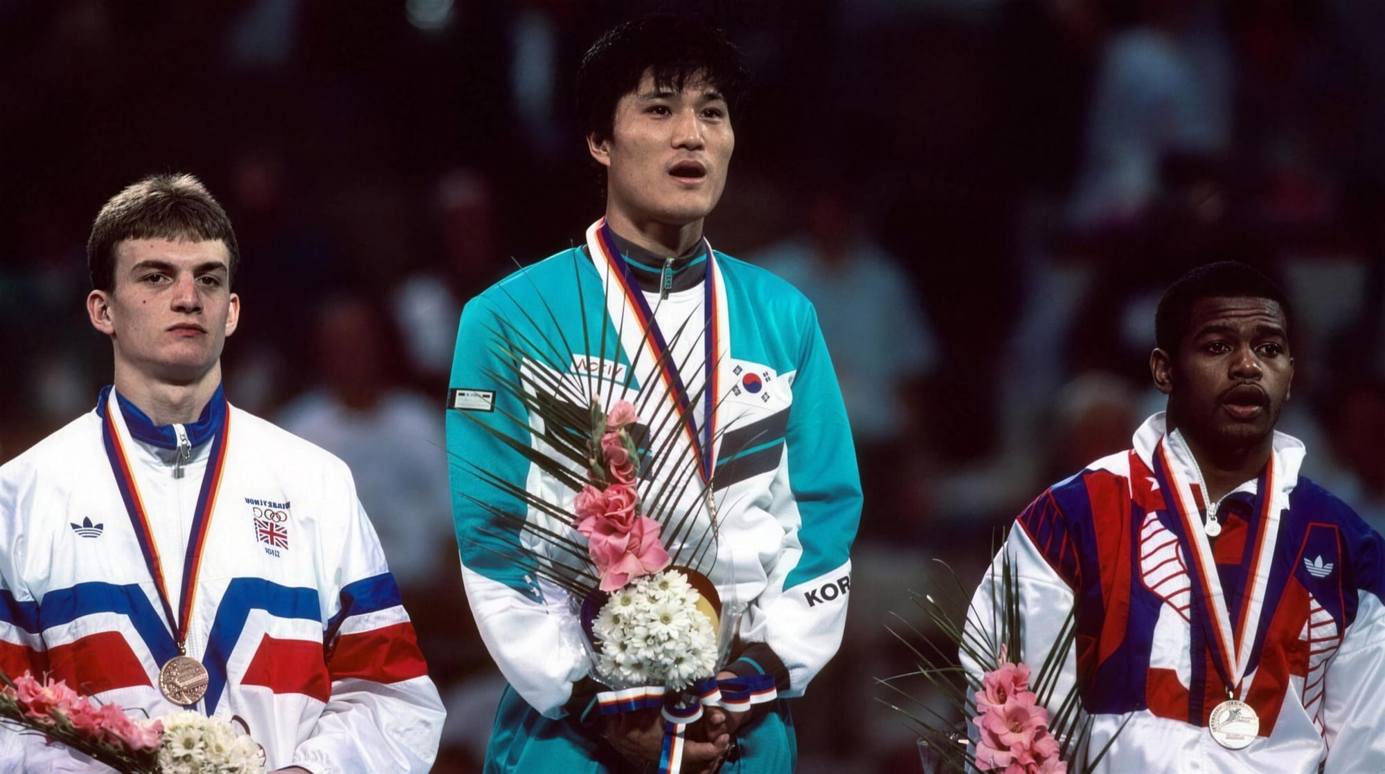 The light middleweight medal ceremony. Park Si-Hun is on the top step.