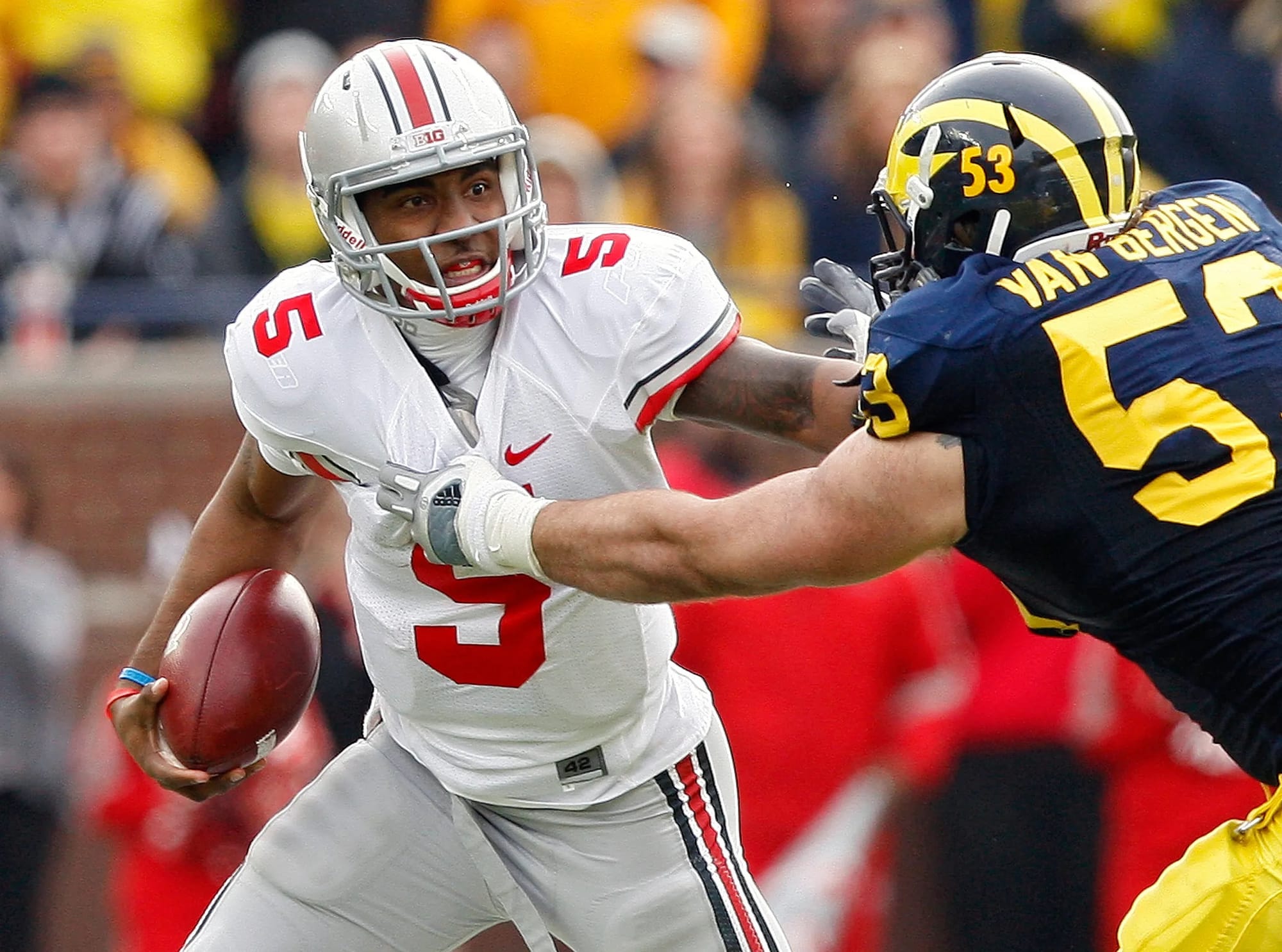 Braxton Miller escaping Michigan’s Ryan Van Bergen in 2011. Miller finished fifth and ninth in the Heisman voting in the two seasons before the one he lost.