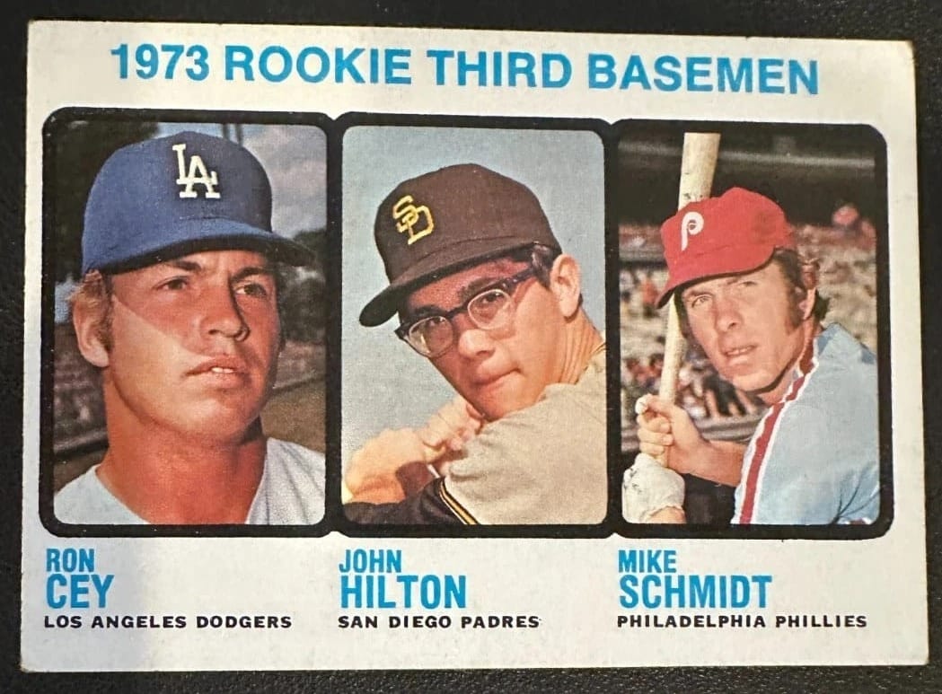 1973 Topps #615: Mike Schmidt, John Hilton — and six-time All-Star Ron Cey. The best supporting cast in the genre.
