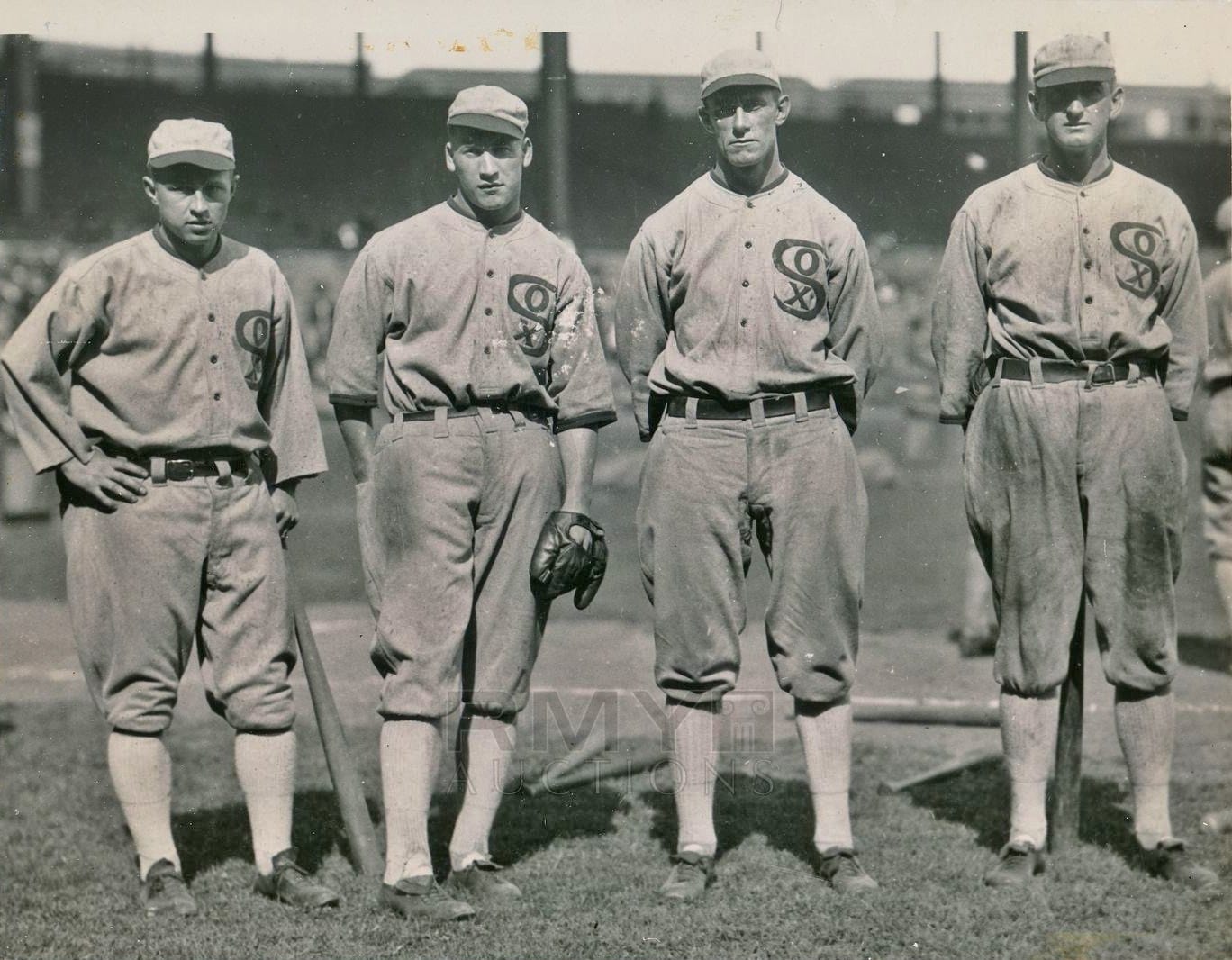 White Sox outfielders on the eve of the 1919 World Series, including Happy Felsch (second from left) and Joe Jackson (far right). (Charles M. Conlon)
