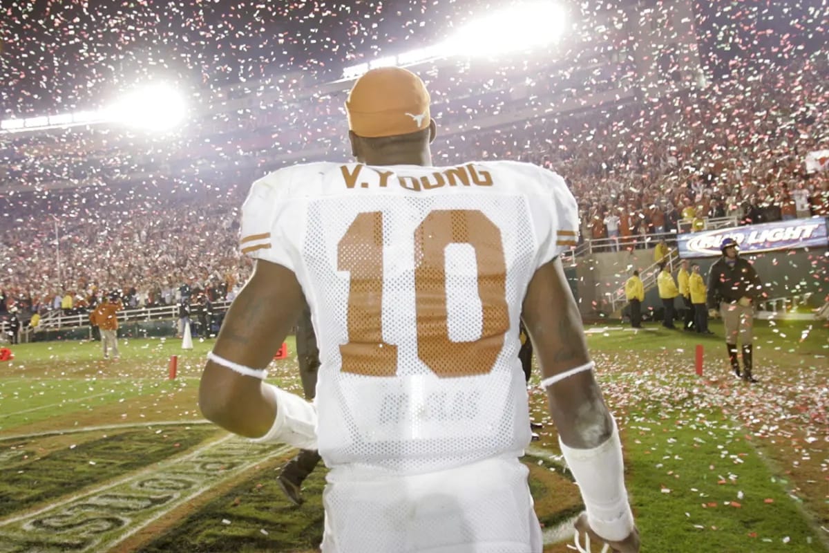 Vince Young walks off the Rose Bowl field under the confetti, Jan. 4, 2006.