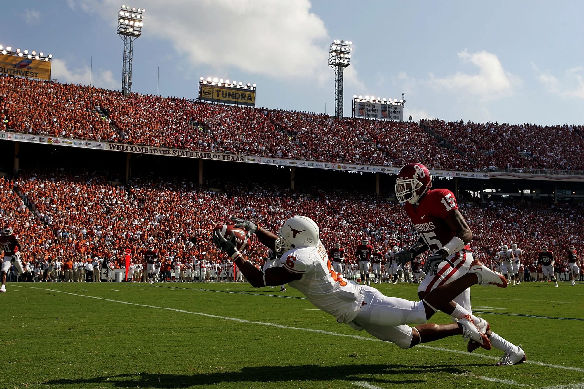 Quan Cosby lays out against Oklahoma in front of a record 92,182.