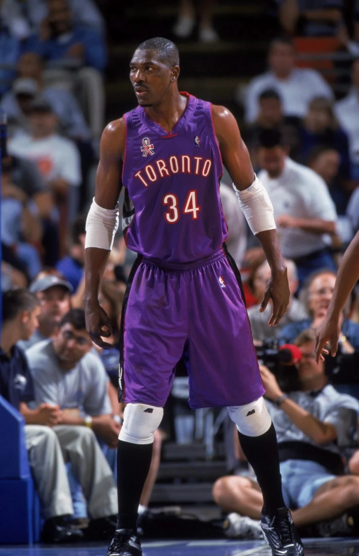 The Dream in Raptors purple, 2001-02 — 61 games of career lows.