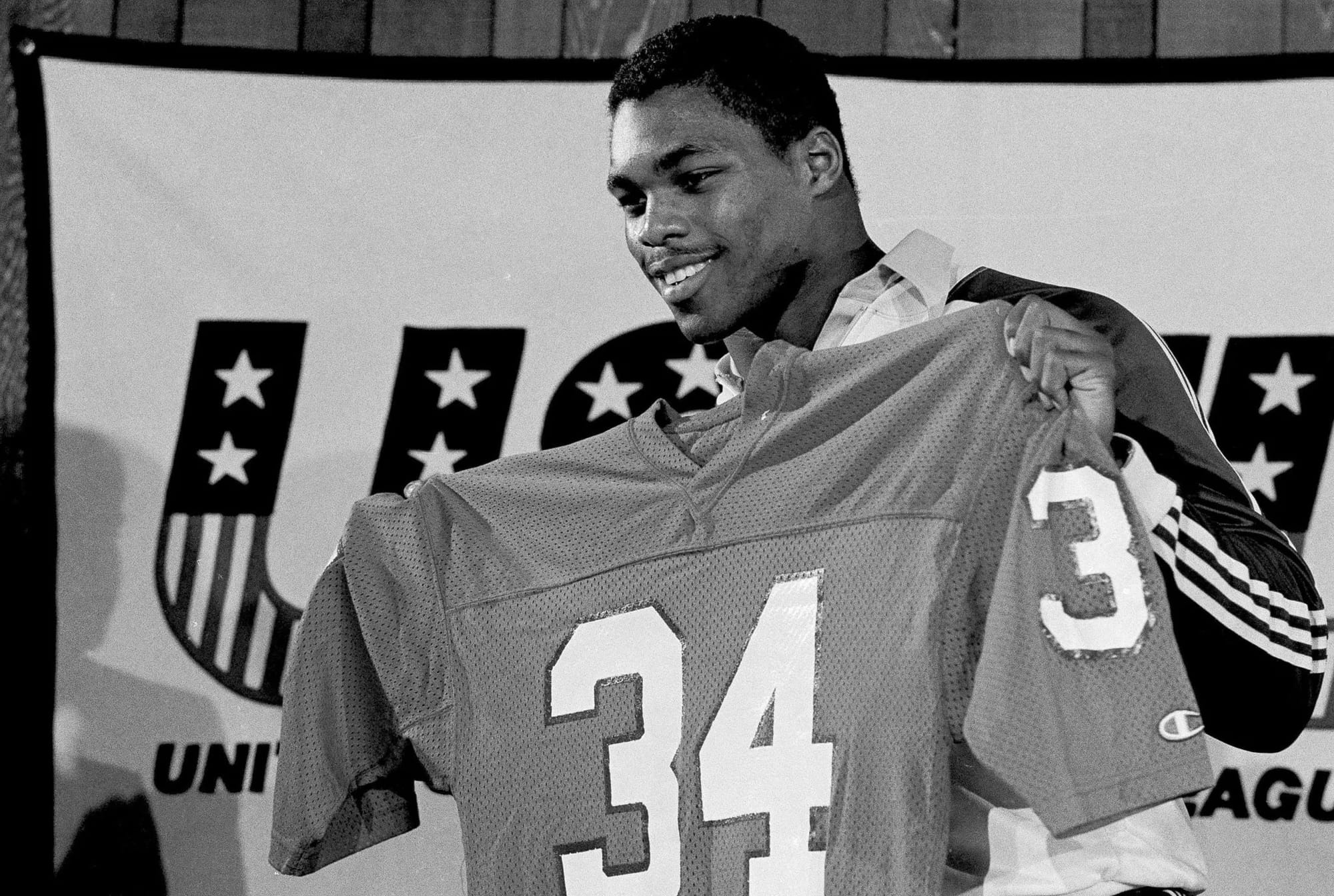 February 1983: Herschel Walker holds up No. 34. The first underclassman to turn pro, and the NFL's rules didn't matter anymore.