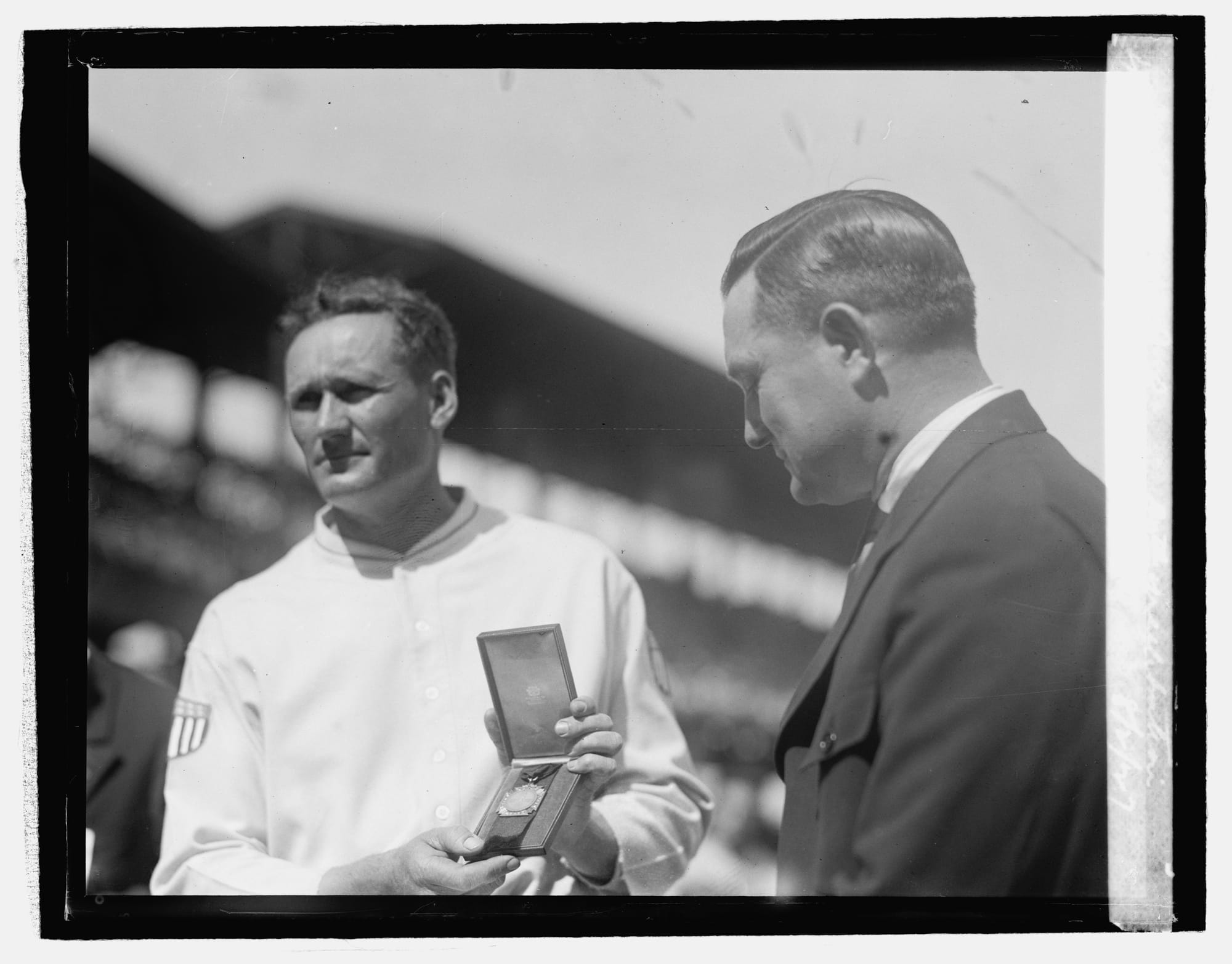 Walter Johnson on Aug. 2, 1927, getting a medal for his 20 years with the Senators. He retired after the season. Photo: National Photo Company, Library of Congress.