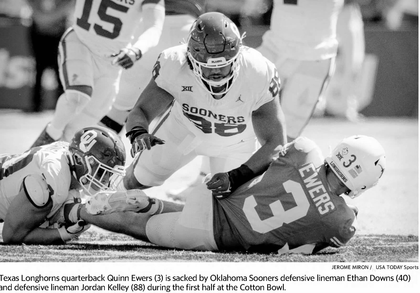 Fort Worth Star-Telegram, October 8, 2023: Quinn Ewers sacked by Ethan Downs and Jordan Kelley at the Cotton Bowl.