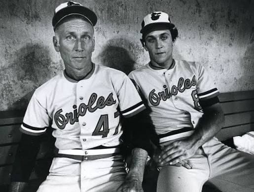 Cal Ripken Sr. (47) and Cal Ripken Jr. The Orioles fired the father 6 games into 1988 with both sons on the roster.