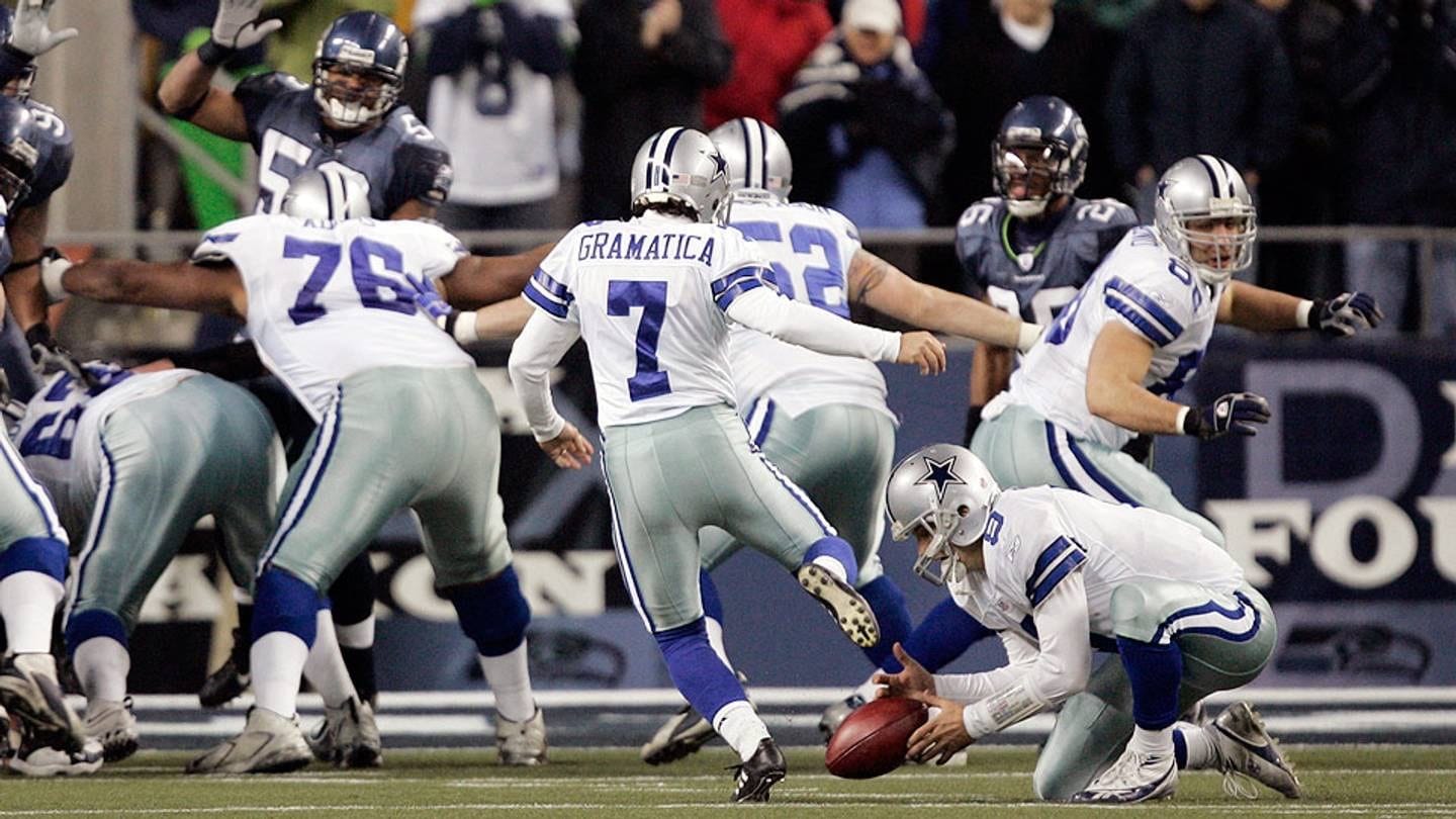Tony Romo loses the hold on the 19-yard field goal try.