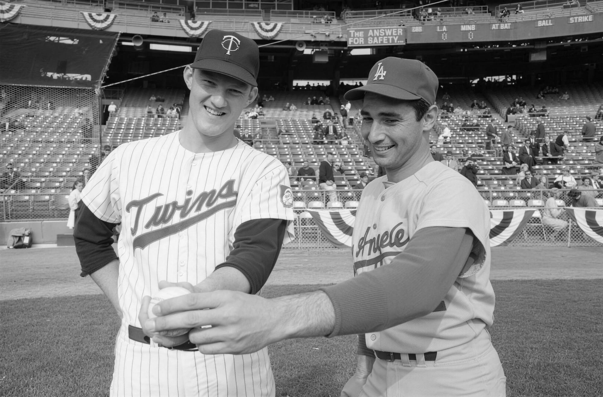Sandy Koufax, right, before the 1965 World Series at Metropolitan Stadium.