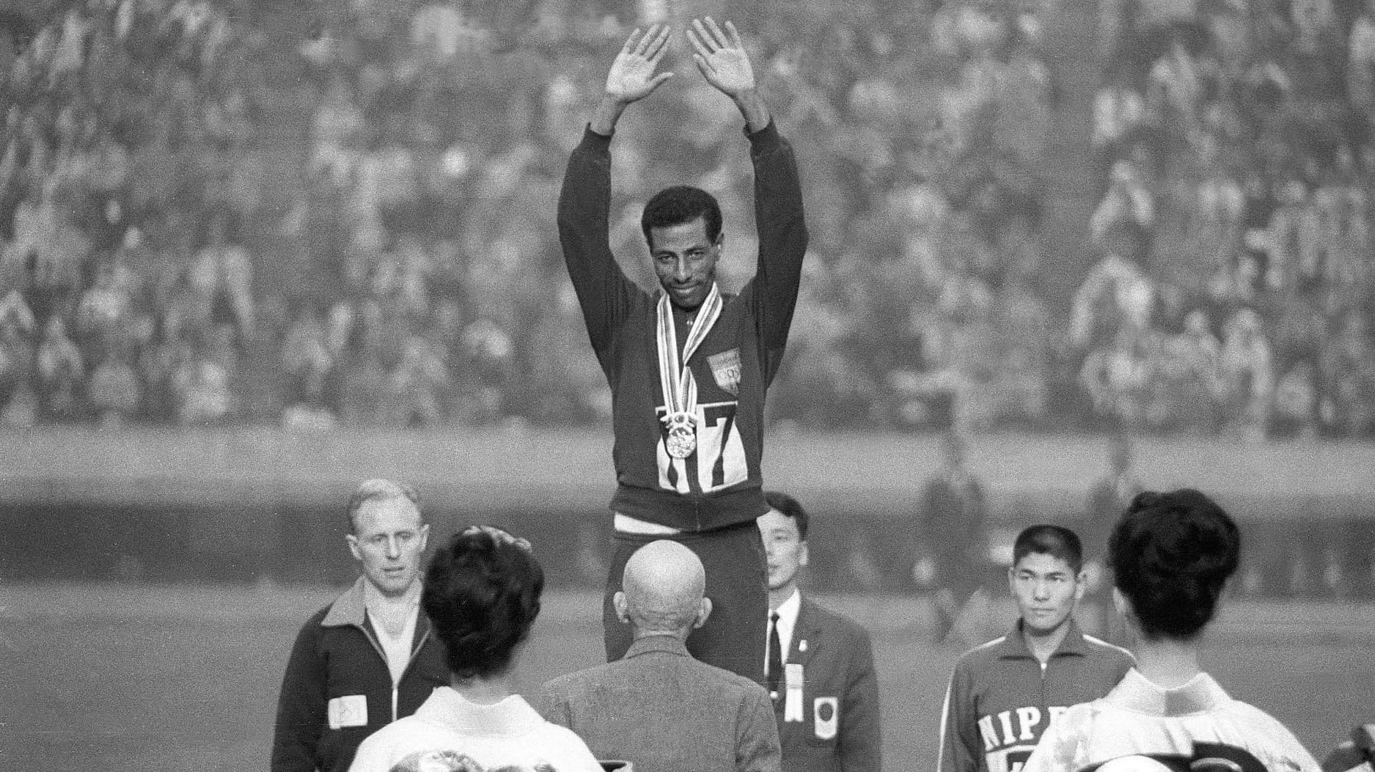 Bikila on the medal stand.