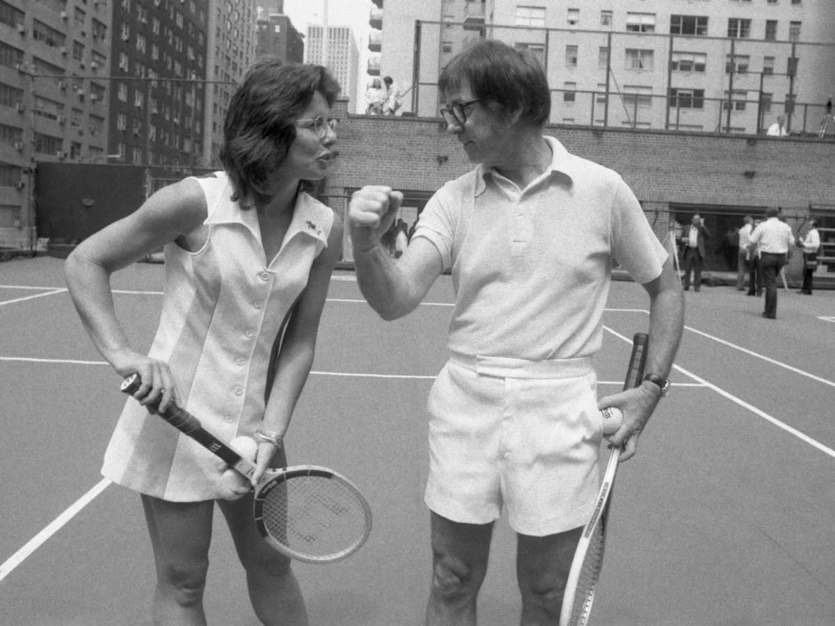 King and Bobby Riggs on a New York rooftop court in 1973, before the Battle of the Sexes.